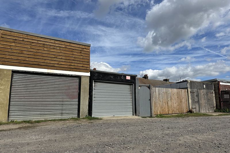 row of modern garages with mixed door types gillingham